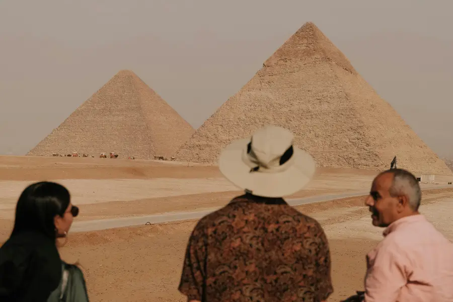 People looking at the Pyramids at Egypt