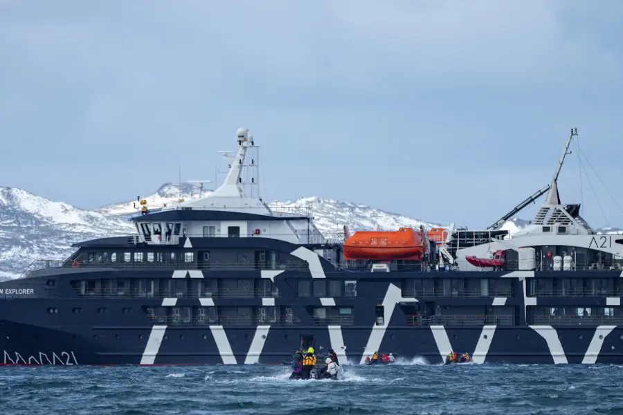 Expedition cruise ship sailing in Antarctic waters.