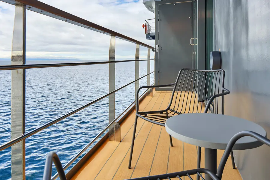 Balcony view from expedition ship overlooking the ocean.